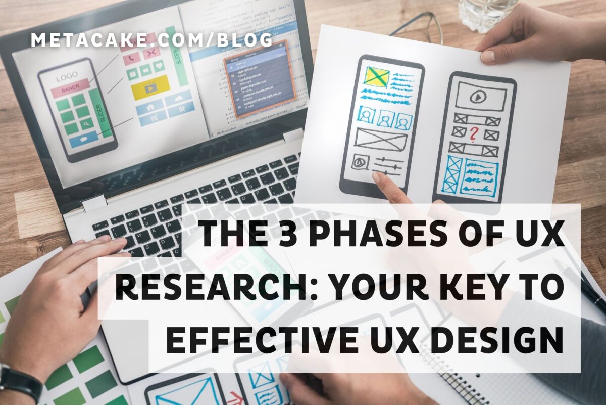 Hands holding a paper with a picture of a user interface are starting the 3 UX research phases.