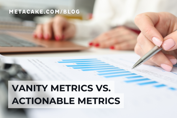 Person with metrics defining vanity metrics vs actionable metrics.